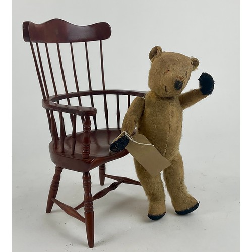 3051 - A well-loved early 20th century blonde mohair jointed bear, straw filled, slightly humped back, stit... 