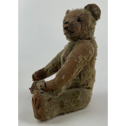 3052 - An early 20th century small mohair jointed teddy bear, with partial hump, straw filled, black eyes, ... 