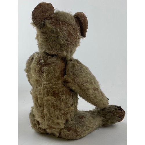 3052 - An early 20th century small mohair jointed teddy bear, with partial hump, straw filled, black eyes, ... 