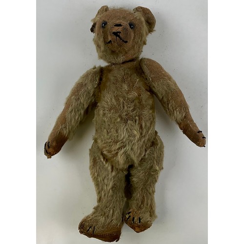 3052 - An early 20th century small mohair jointed teddy bear, with partial hump, straw filled, black eyes, ... 