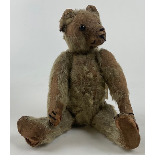 3052 - An early 20th century small mohair jointed teddy bear, with partial hump, straw filled, black eyes, ... 
