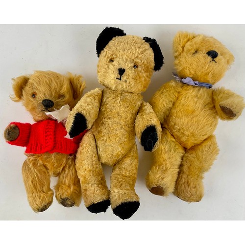 3054 - A 1950’s Sooty type silk Teddy bear, black ears and paws, a,beer glass eyes with stitched nose and m... 