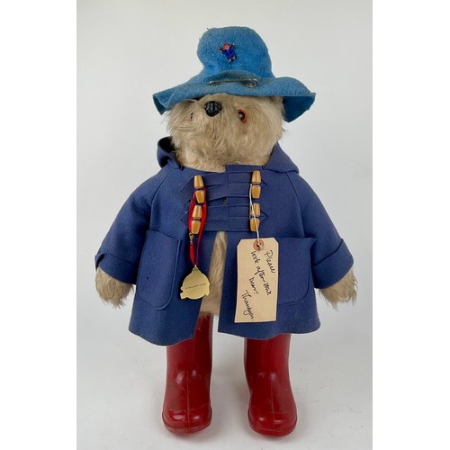 3059 - A 1970s plush Paddington Bear, manufactured by Gabrielle Designs, having original red ‘PB’ wellingto... 