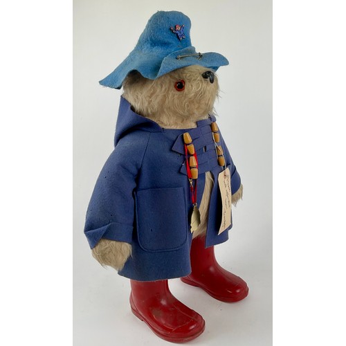 3059 - A 1970s plush Paddington Bear, manufactured by Gabrielle Designs, having original red ‘PB’ wellingto... 
