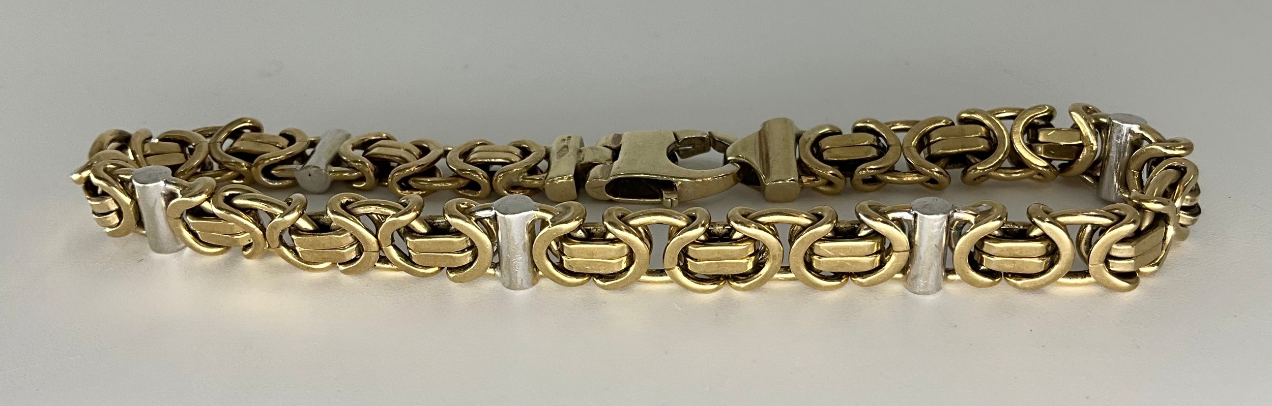 A 9ct gold fancy link bracelet, London import marks, 22.6g