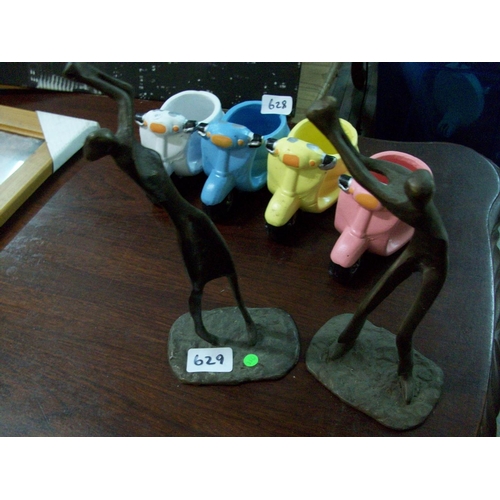 629 - 2 Heavy Golf Ornaments - (sas)