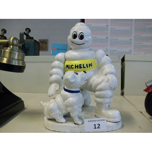 12 - Cast Iron Michelin Man & Dog