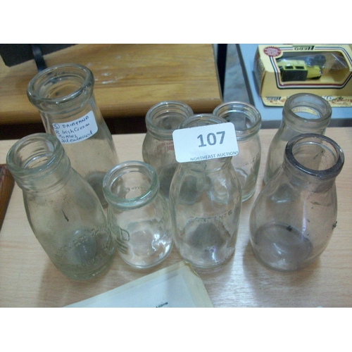 107 - 8 Dairyana Irish Cream Bottles All Embossed