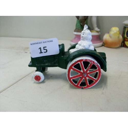 15 - Cast Iron Michelin Man On Tractor