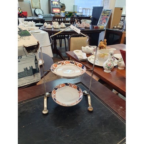 270 - 2 Tuscon China Plates On Silver Plate Stand