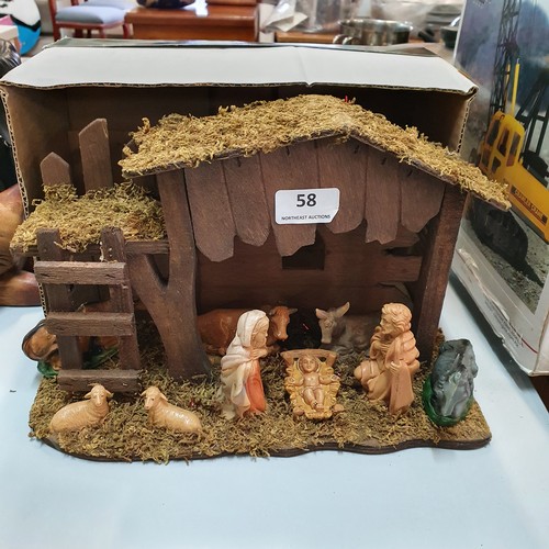 58 - Small Nativity Crib with Figurines