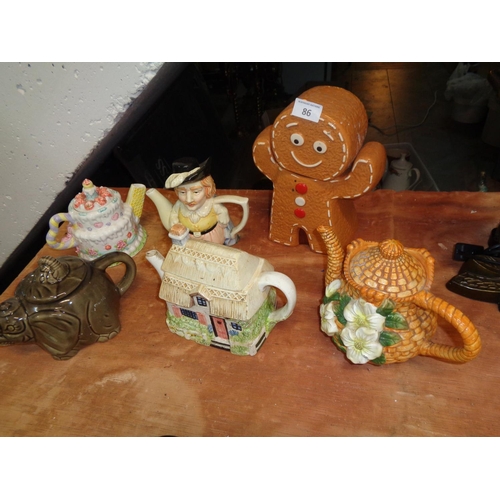 86 - Lot of Ceramic Teapots & Biscuit Barrel (sd)