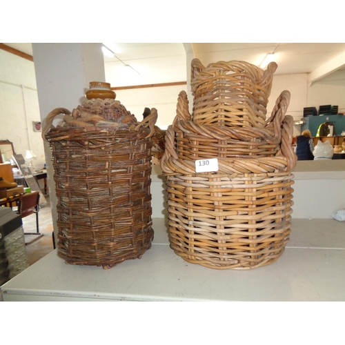 130 - 3 Graduating Wicker Baskets & Stoneware Flagon in Basket