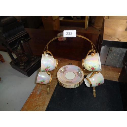 238 - Cup & Saucer Set on Brass Rack