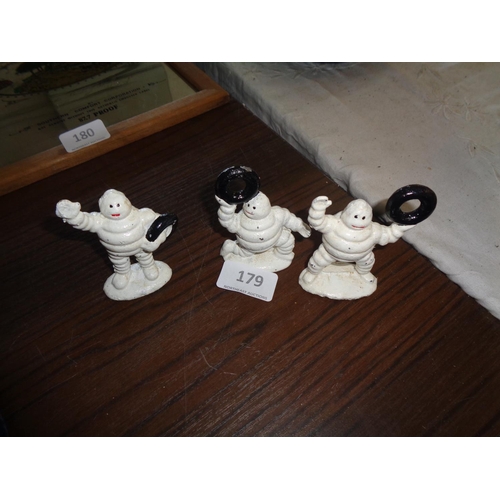 179 - 3 Small Cast Iron Michelin Men