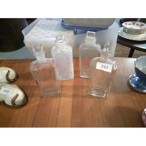 243 - 4 Vintage Chemist Bottles