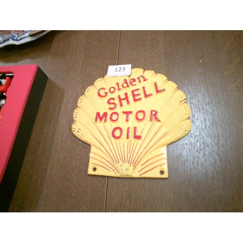 123 - Cast Iron Shell Sign