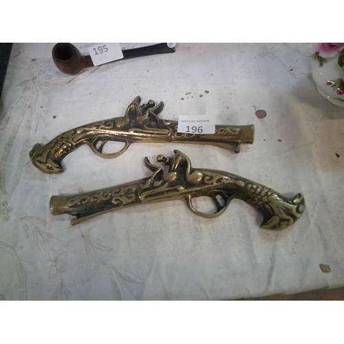 196 - 2 Brass Gun Wall Hangings