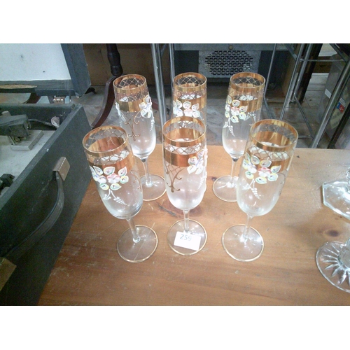 259 - 6 Gold Rimmed Floral Champagne Flutes