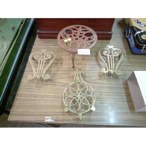 225 - 4 Brass Trivets