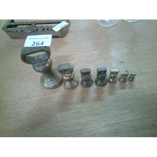 264 - 7 Brass Shop Weights