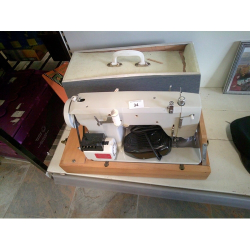 34 - Vintage Sewing Machine (w)