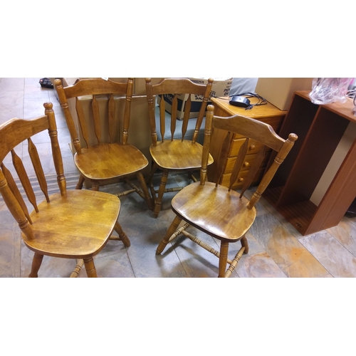 111 - Set of four pine solid wood dining chairs with turned spindle backrests and legs