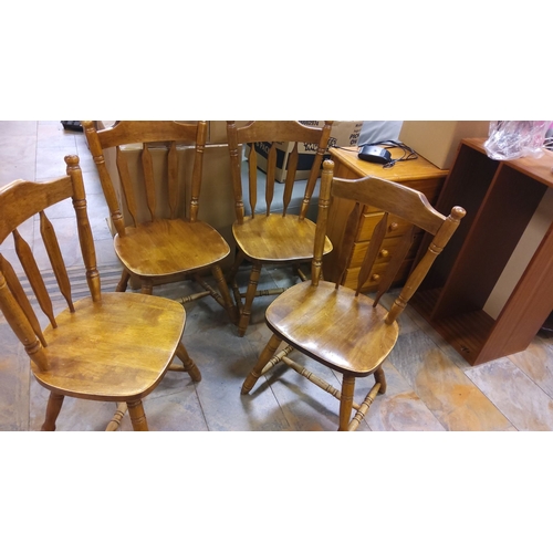 111 - Set of four pine solid wood dining chairs with turned spindle backrests and legs