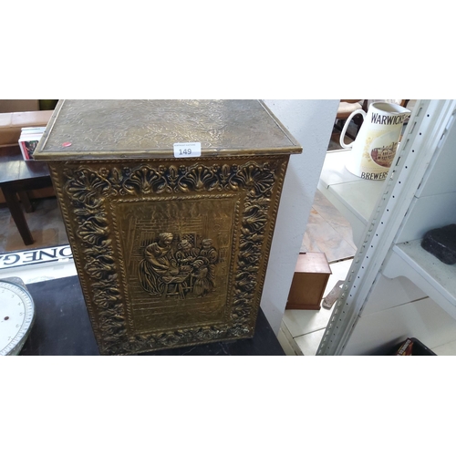 149 - Victorian brass coal box with an embossed family scene and ornate floral borders. Rectangular shape ... 