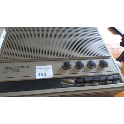 160 - Hitachi unit with AC/DC/Battery capabilities. Includes a color television, FM/MW/LW radio, and casse... 