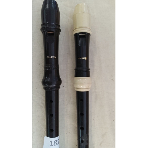 182 - Pair of plastic recorders, black in color. Brands include Aulos and Percussion Plus.