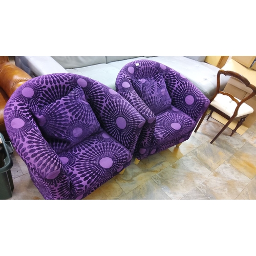 185 - Pair of vibrant purple tub armchairs with radiating circle pattern design. The chairs come with plus... 