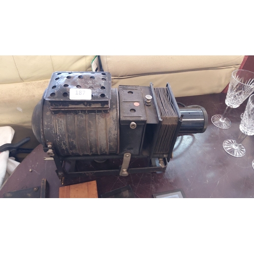 187 - Vintage Magic Lantern with slide holders. Mid-20th century. Includes projector unit and multiple woo... 