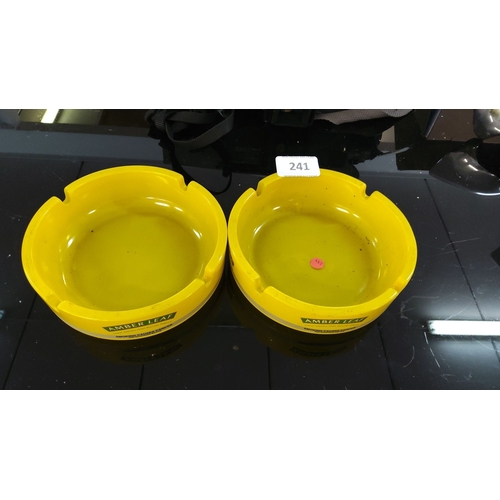 241 - Pair of vintage yellow Amber Leaf ashtrays.