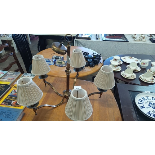 279 - Mid-Century Modern brass chandelier with five pleated fabric shades and adjustable central lamp.