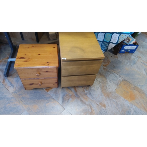 306 - Pair of two-drawer wooden bedside cabinets, one in pine and the other in light oak finish.