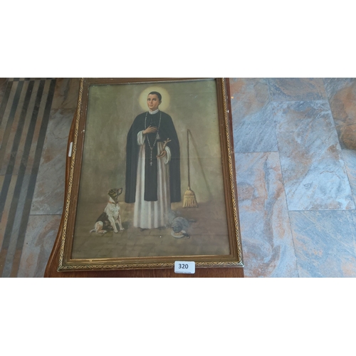 320 - Framed print depicting St Martin holding a cross, accompanied by a dog and a broom. The artwork show... 