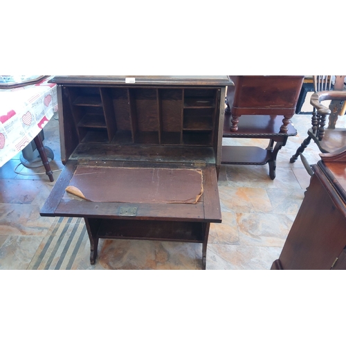 331 - Vintage wooden drop-front desk with an inlay design on the front panel. Includes interior compartmen... 