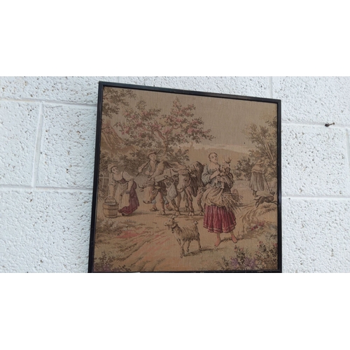 337 - Framed tapestry with a depiction of a pastoral scene including figures, animals, and trees. The desi... 