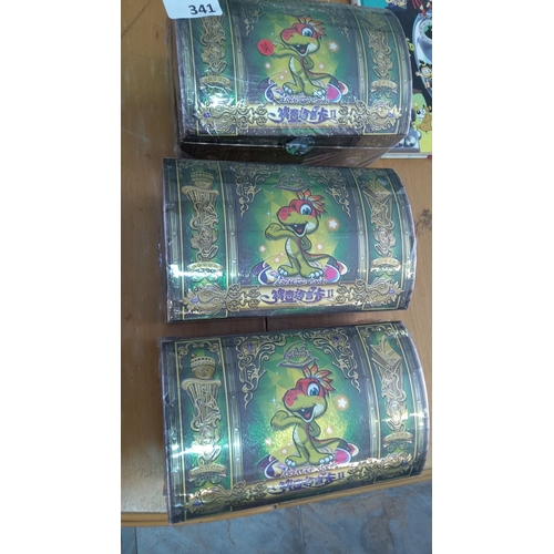 341 - Three sealed boxes of AR Magic Cards. The boxes feature a colorful design with a cartoon dinosaur ch... 