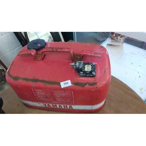 384 - Vintage Yamaha outboard motor fuel tank. This item is characterized by a fetching red color and is m... 