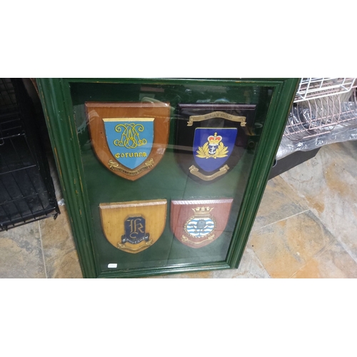 428 - Collection of four military crest plaques, including insignias from Corunna Field Battery, and other... 