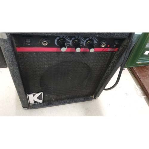 433 - Kustom KGA10 guitar amplifier features three control knobs for gain, volume, and tone adjustments.