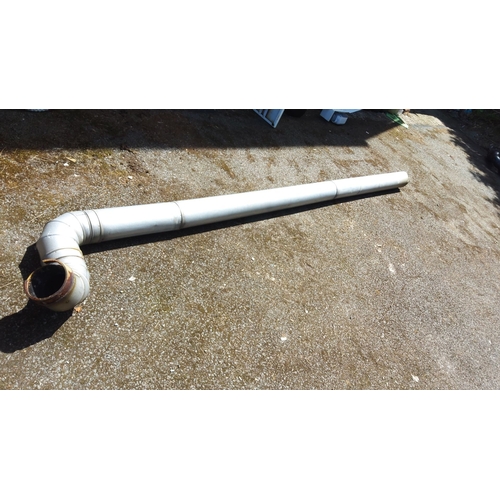 449 - Industrial metal pipe with right-angle bend, approximately 10 feet in length. Material: Likely steel... 