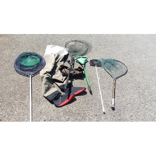 459 - Fishing equipment ensemble comprising three landing nets, waders, neoprene boots, and a green fish g... 