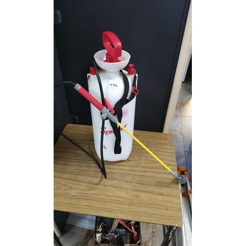 476 - 8L garden sprayer with shoulder strap, red handle, and adjustable nozzle.