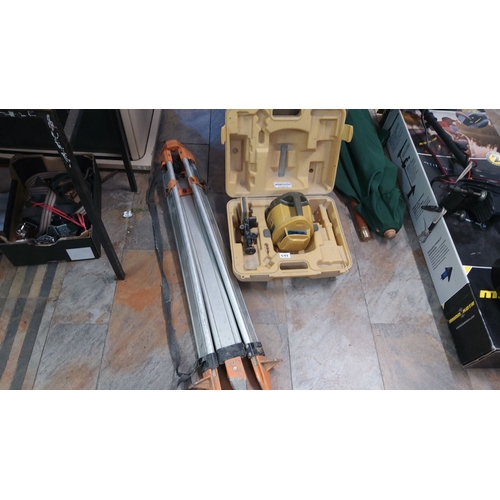 477 - Construction equipment lot including a rotary laser level with carrying case, tripod, and additional... 