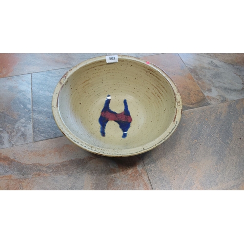 503 - Handcrafted Pottery salad bowl with an abstract blue and red central design on a beige background.