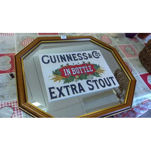 512 - Replica Framed Guinness & Co. Extra Stout mirror, octagonal shape with wooden frame. Features classi... 