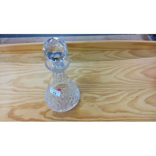 73 - Tyrone crystal decanter with a faceted stopper, featuring an intricate diamond pattern design.